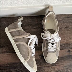 TOTEME 37
raised-monogram leather sneakers